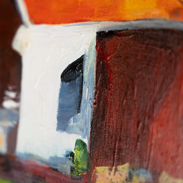 Ausschnitt eines Gebäudes mit dicker Farbschicht in Weiß und Rot