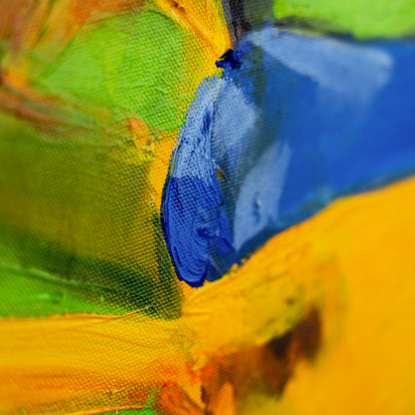 Texturierte Farbschichten in Gelb und Blau auf Leinwand