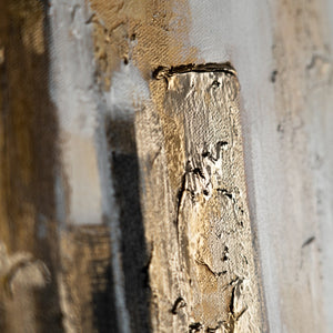 Nahaufnahme goldfarbener Spachtelstruktur