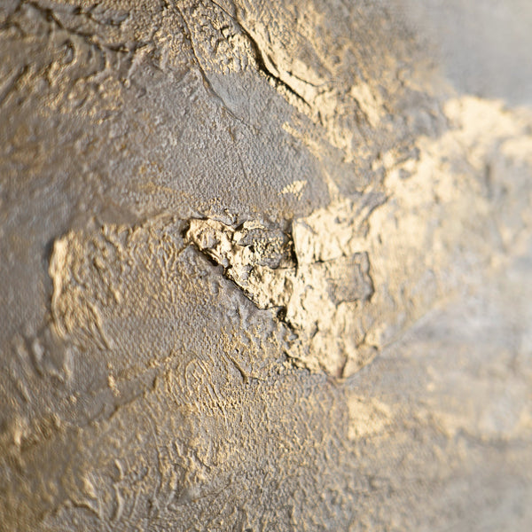 Nahaufnahme goldene Pinselstruktur auf Leinwand