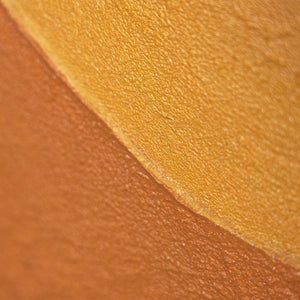 Reliefkunst Sonnenmotiv Terrakotta sanft